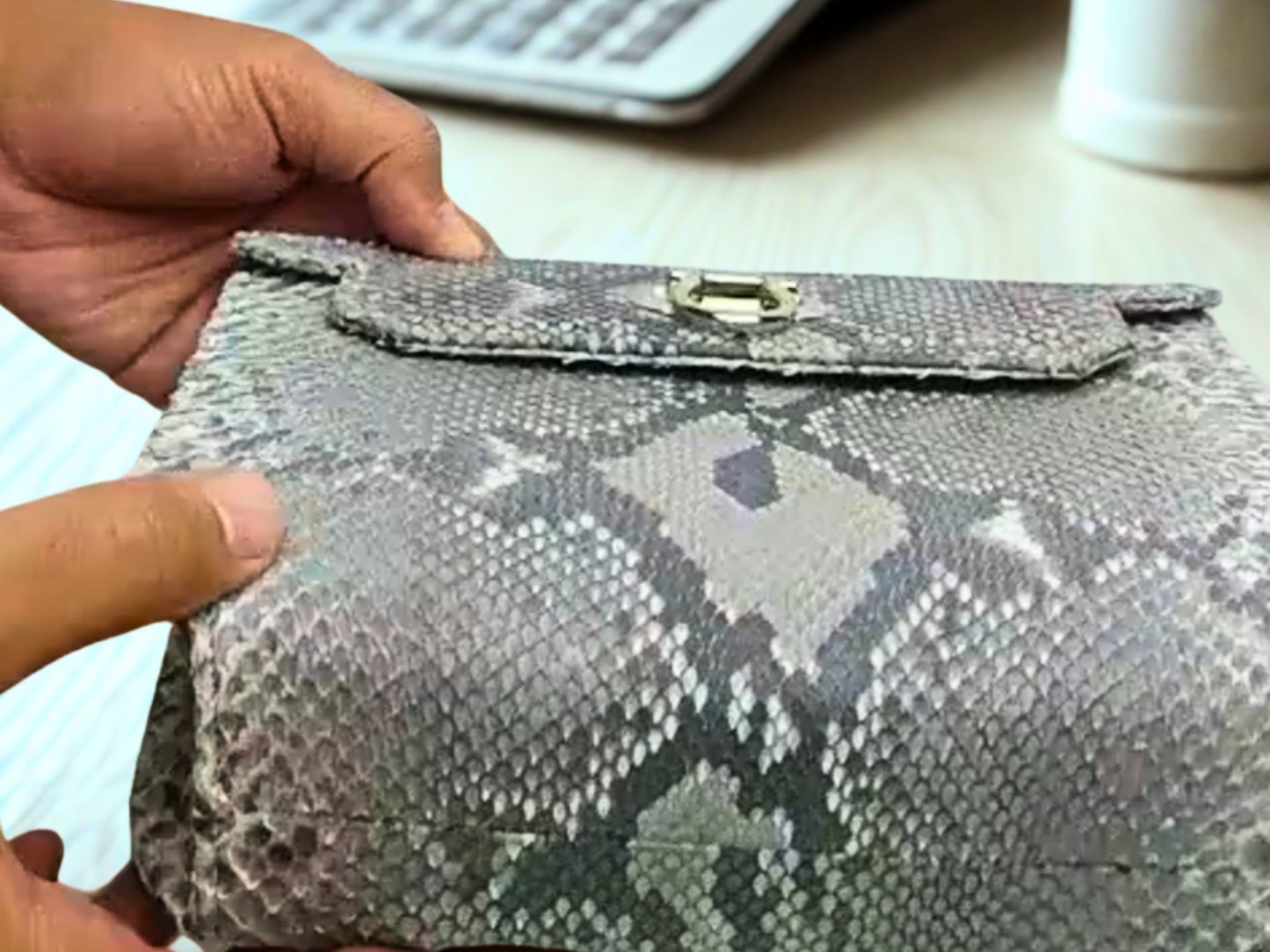 Designer Python Clutch Bags on bottom side view