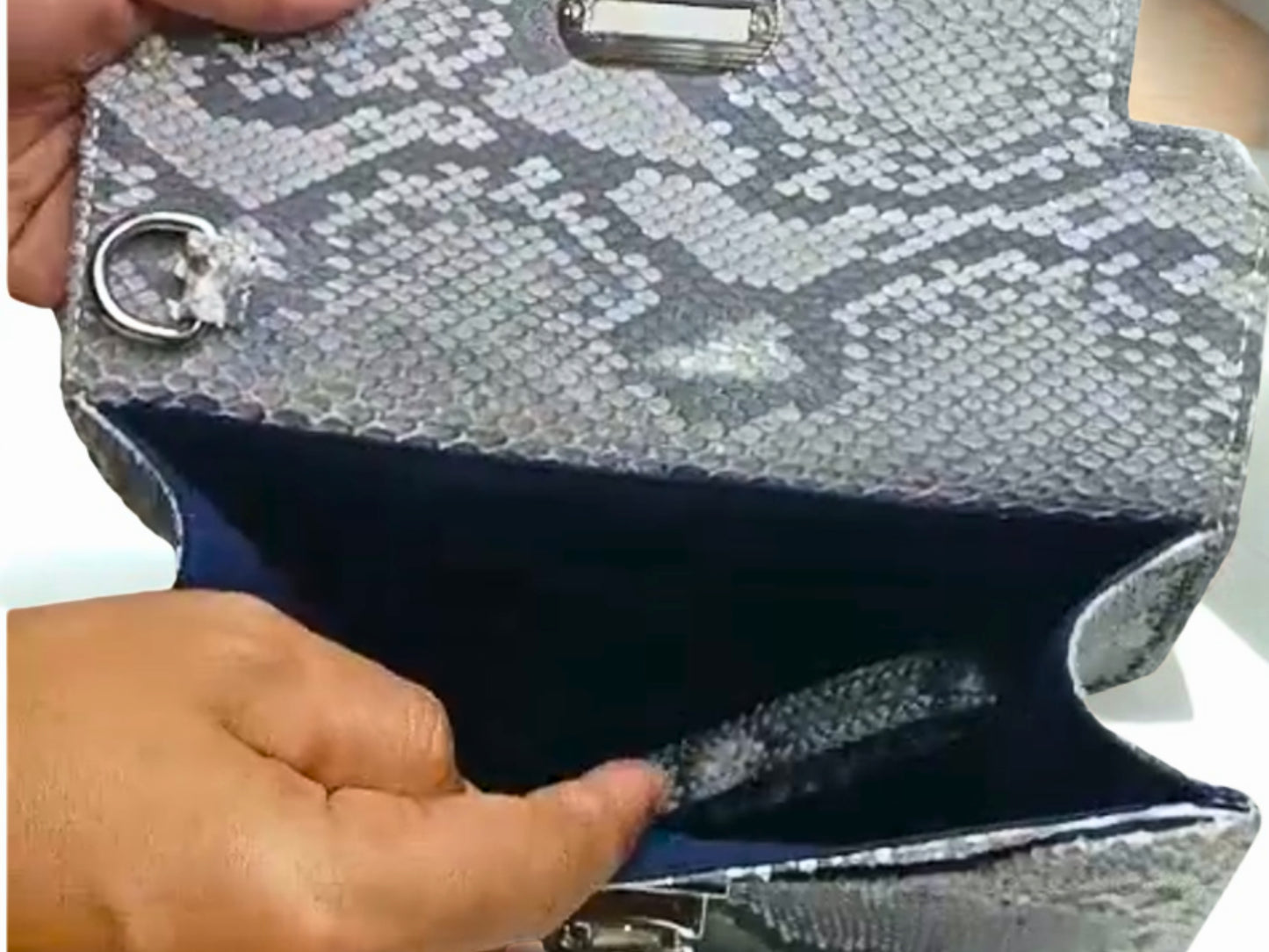 Designer Python Clutch Bags on inside view with blue suede fabric