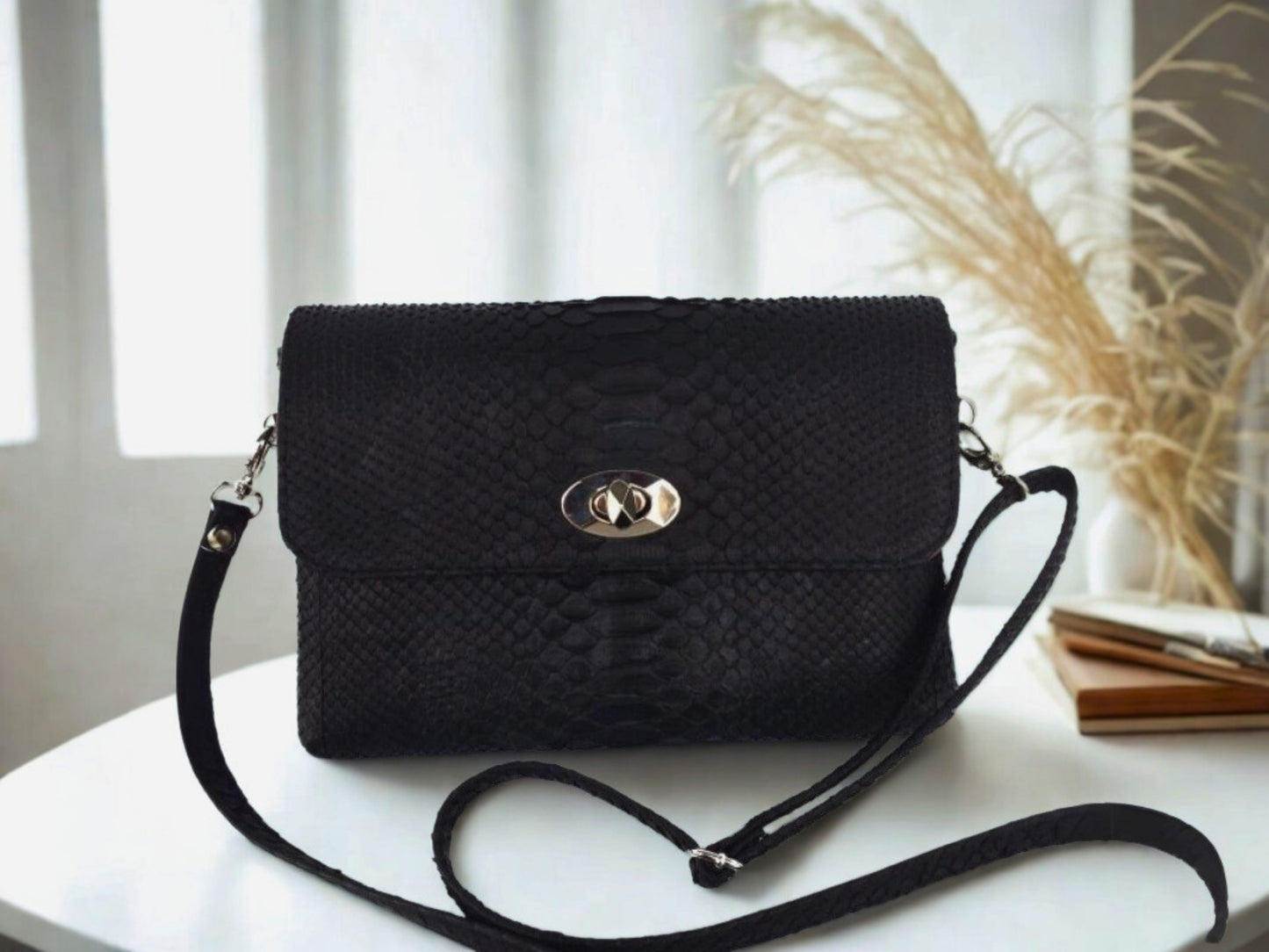 Snakeskin Leather Bag Back Waist Strap - black color on white table at office