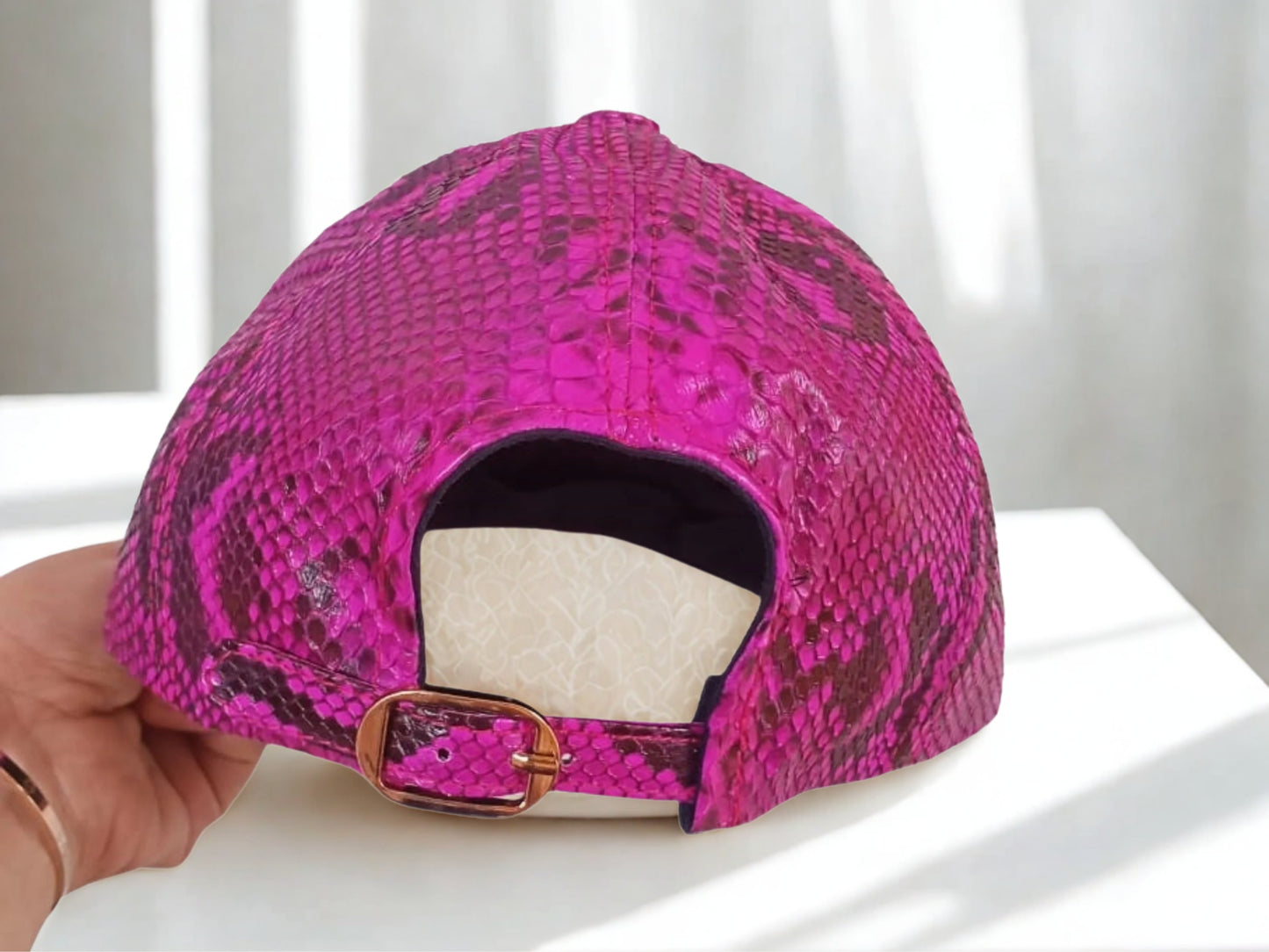 Snakeskin Trucker Hats on pink color with back side view