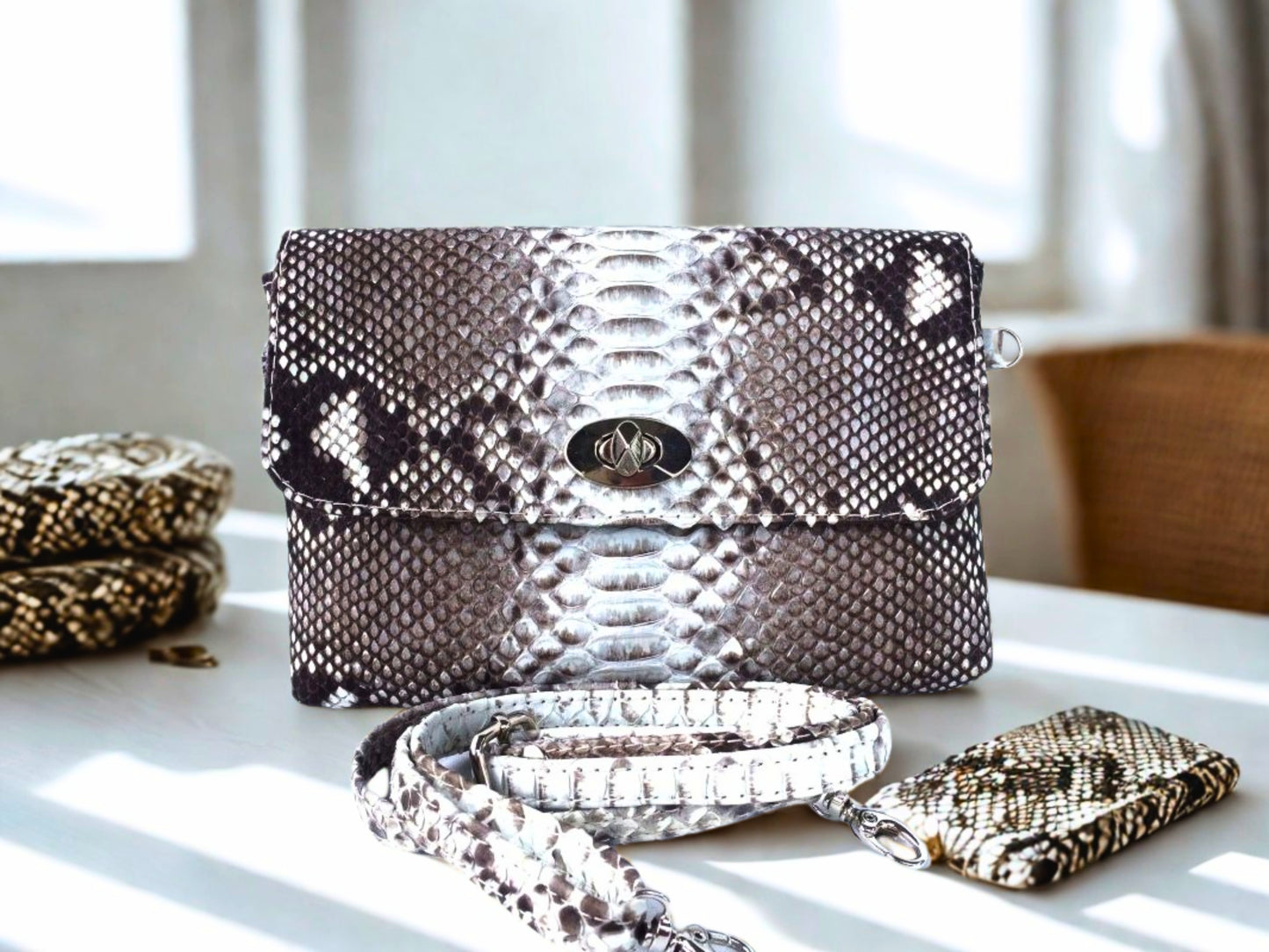 Snakeskin Leather Bag Back Waist Strap - gray color on white table at restaurant
