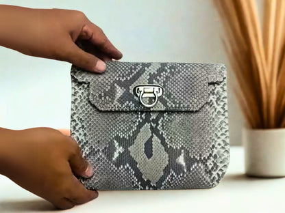 Designer Python Clutch Bags view on hands that size is suitable for everyday bag