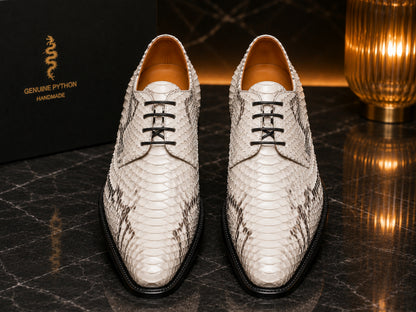 Pair of white genuine python snakeskin dress shoes with black laces