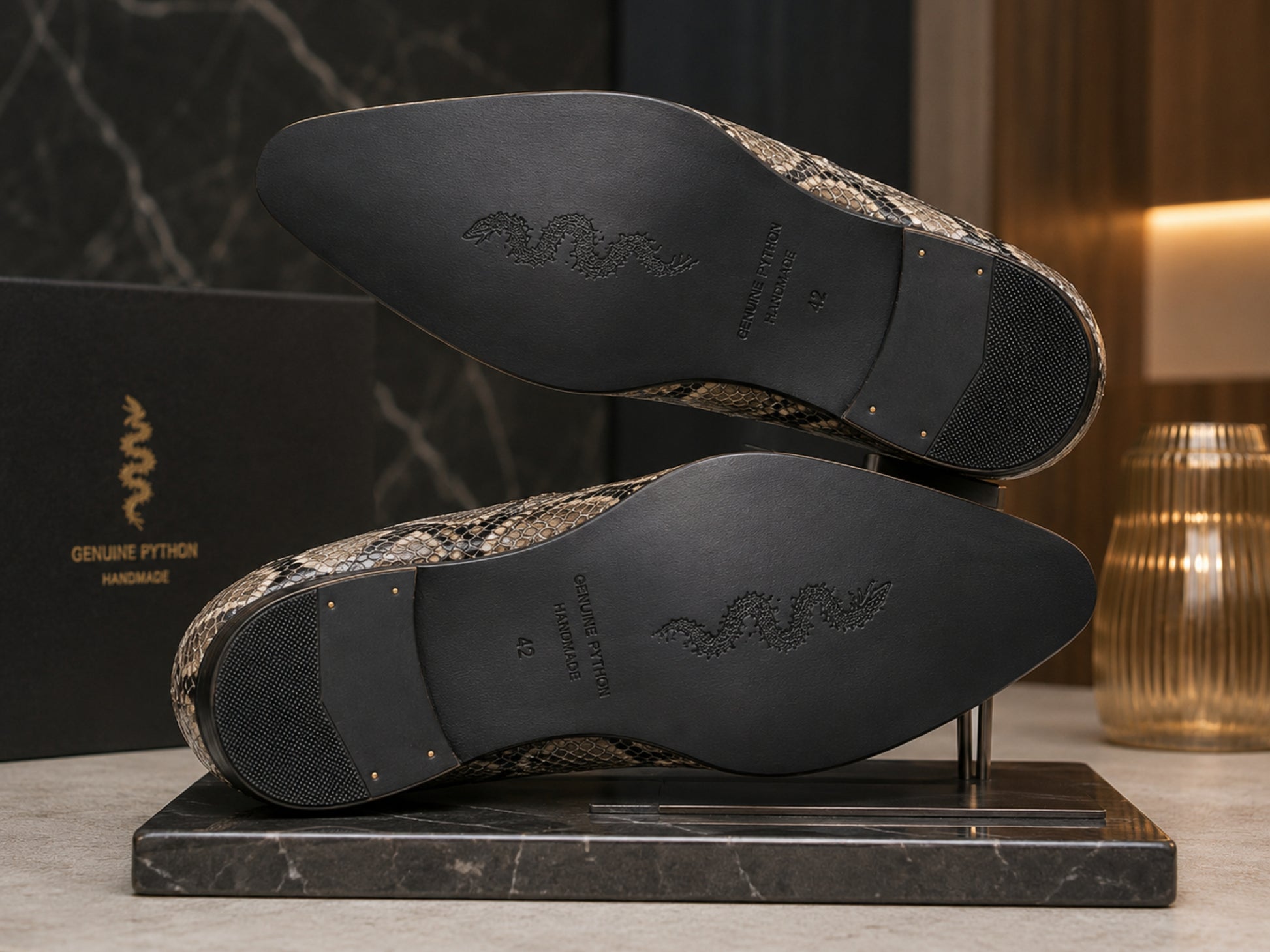 Genuine python snakeskin dress shoes displayed with detailed black leather soles