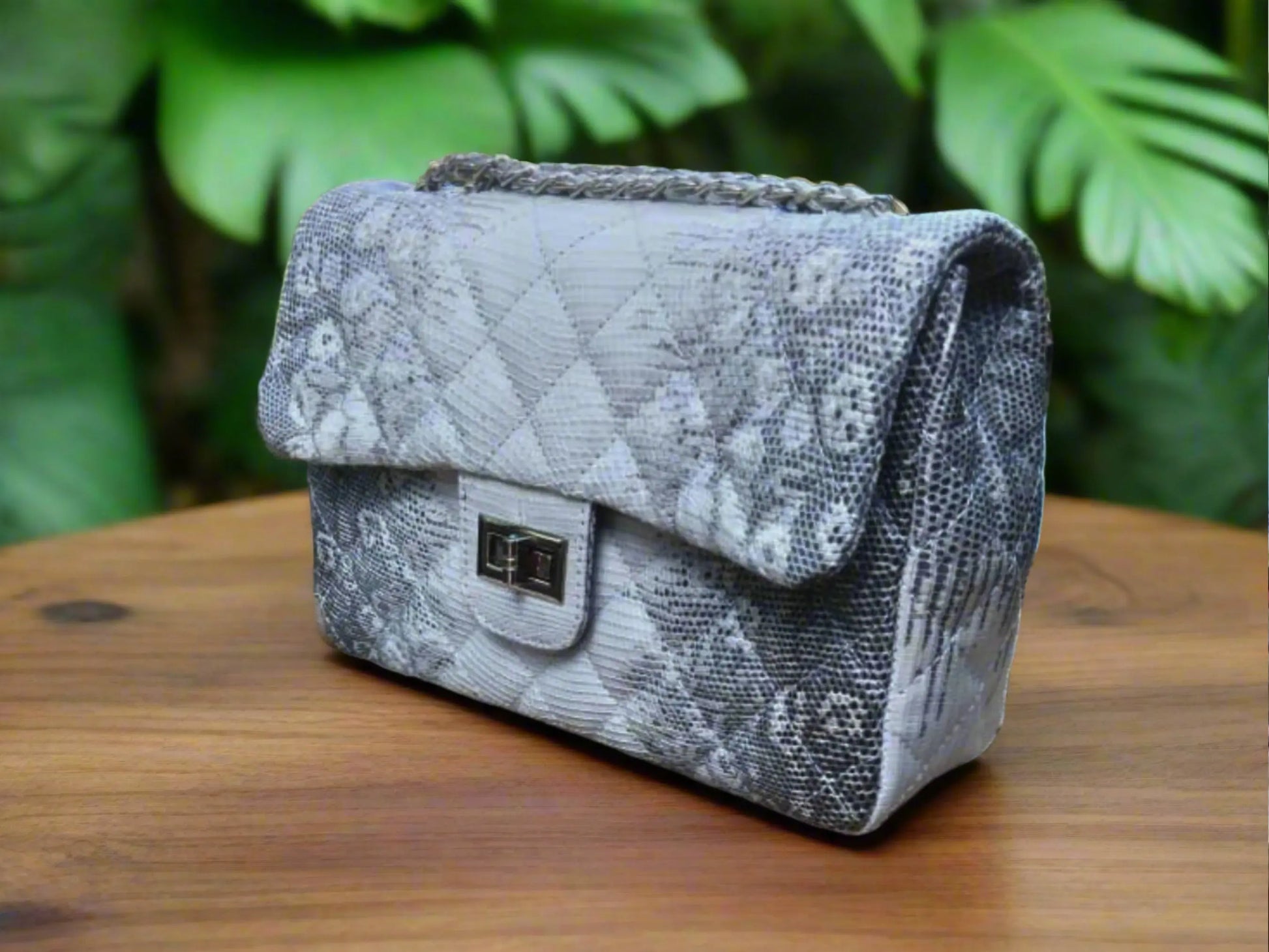 Exotic Quilted Lizard Skin Bag on wood table