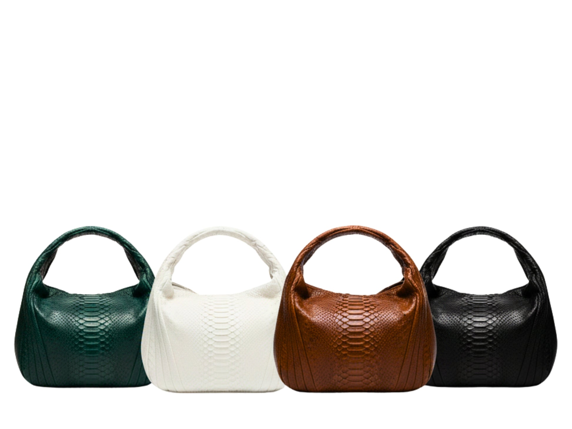 Four handbags with different color patterns on a white background