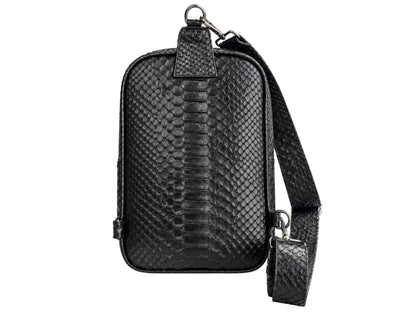 Black python-textured leather crossbody phone bag with a matching adjustable shoulder strap and silver-tone hardware, shown against a plain white background.
