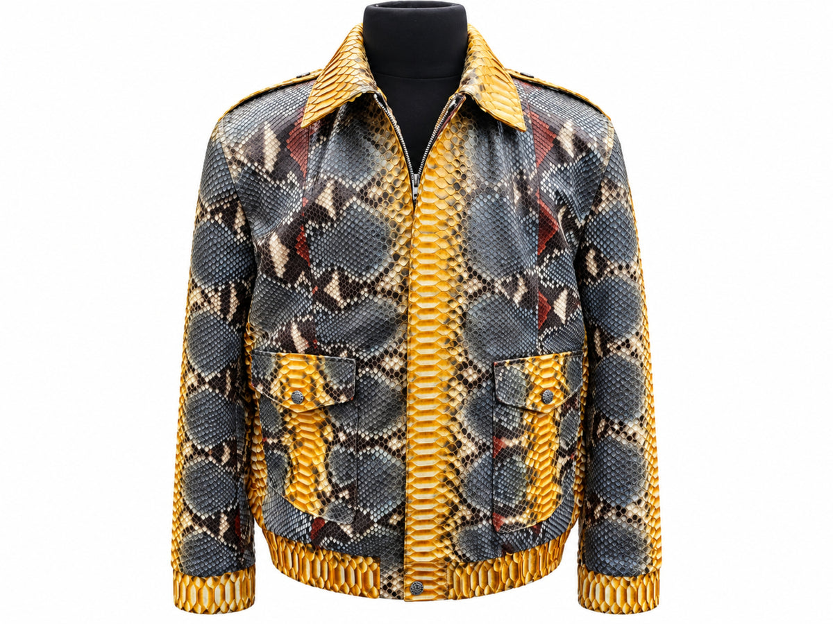 Front view of a men's python snakeskin leather jacket featuring mustard gold panels, charcoal geometric markings, pointed collar, long sleeves, and two flap pockets on a white background.