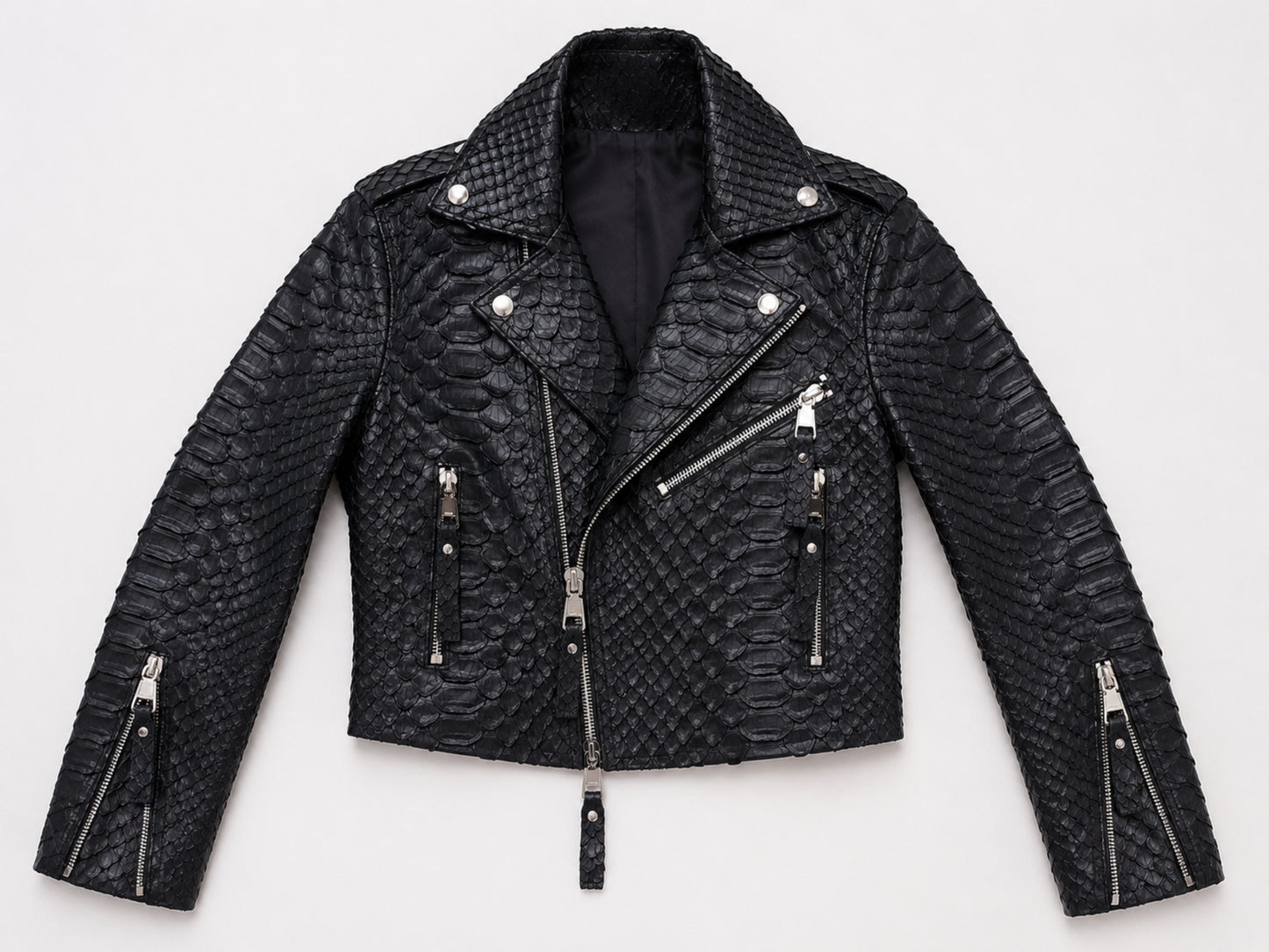 A black textured real snakeskin biker jacket with silver-tone hardware, displayed flat against a light gray background.