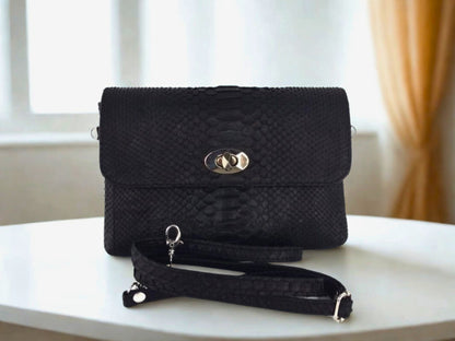 Snakeskin Leather Bag Back Waist Strap - black color on white table at home