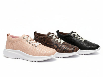 Three pairs of sneakers in pink, brown, and black on a white background