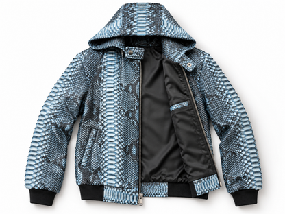 A hooded bomber jacket featuring a blue and gray python print pattern on the exterior, with a black satin-lined interior and black ribbed cuffs and hem.
