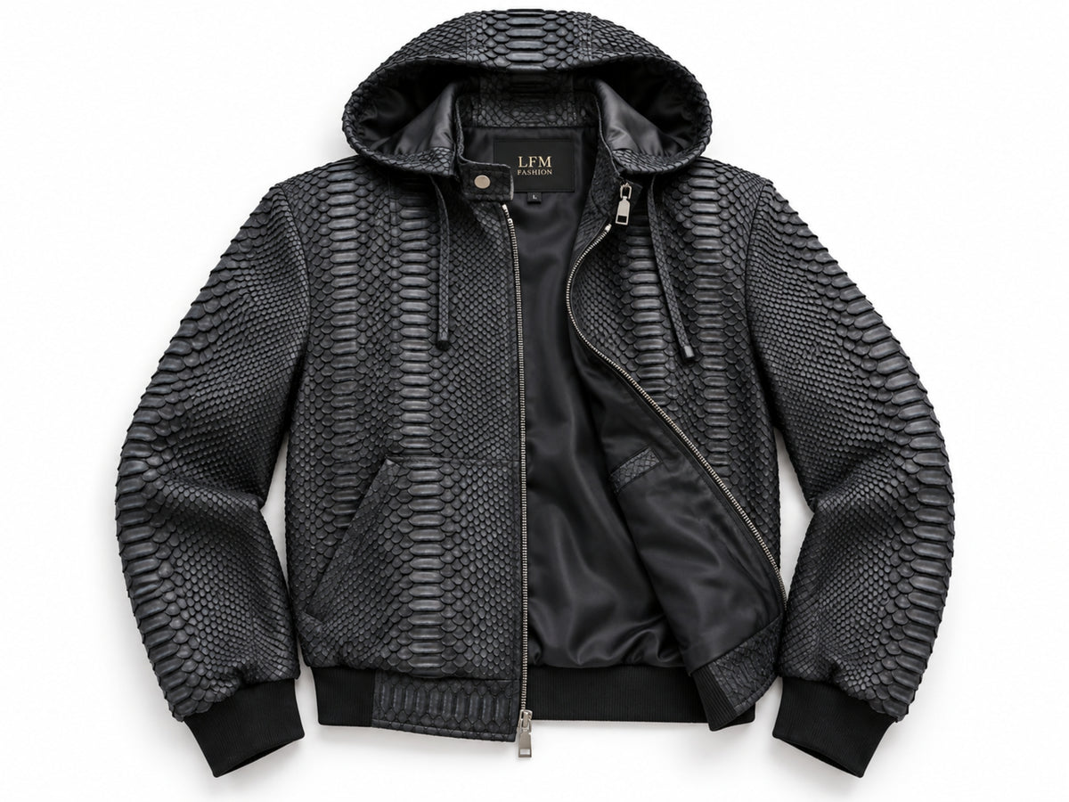 A black hooded bomber jacket featuring textured snakeskin-patterned panels on the hood, shoulders, and sleeves, with a smooth black satin front panel and black ribbed cuffs and hem.
