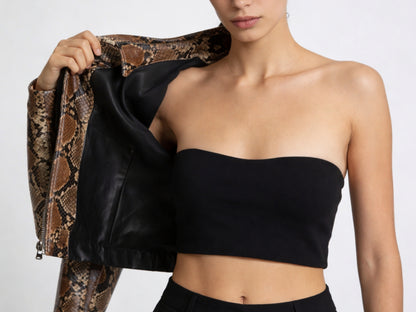 Model removing snakeskin leather jacket showing interior lining