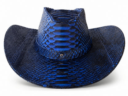 A blue and black python-patterned cowboy hat with a wide brim, photographed against a plain white background.