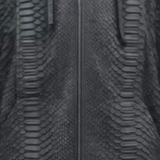 Black python snakeskin hooded bomber jacket with full zip front and textured scale pattern