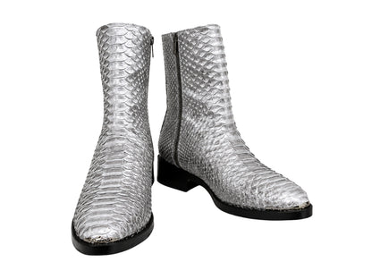 Pair of genuine silver gray python snakeskin leather boots with black soles and heels